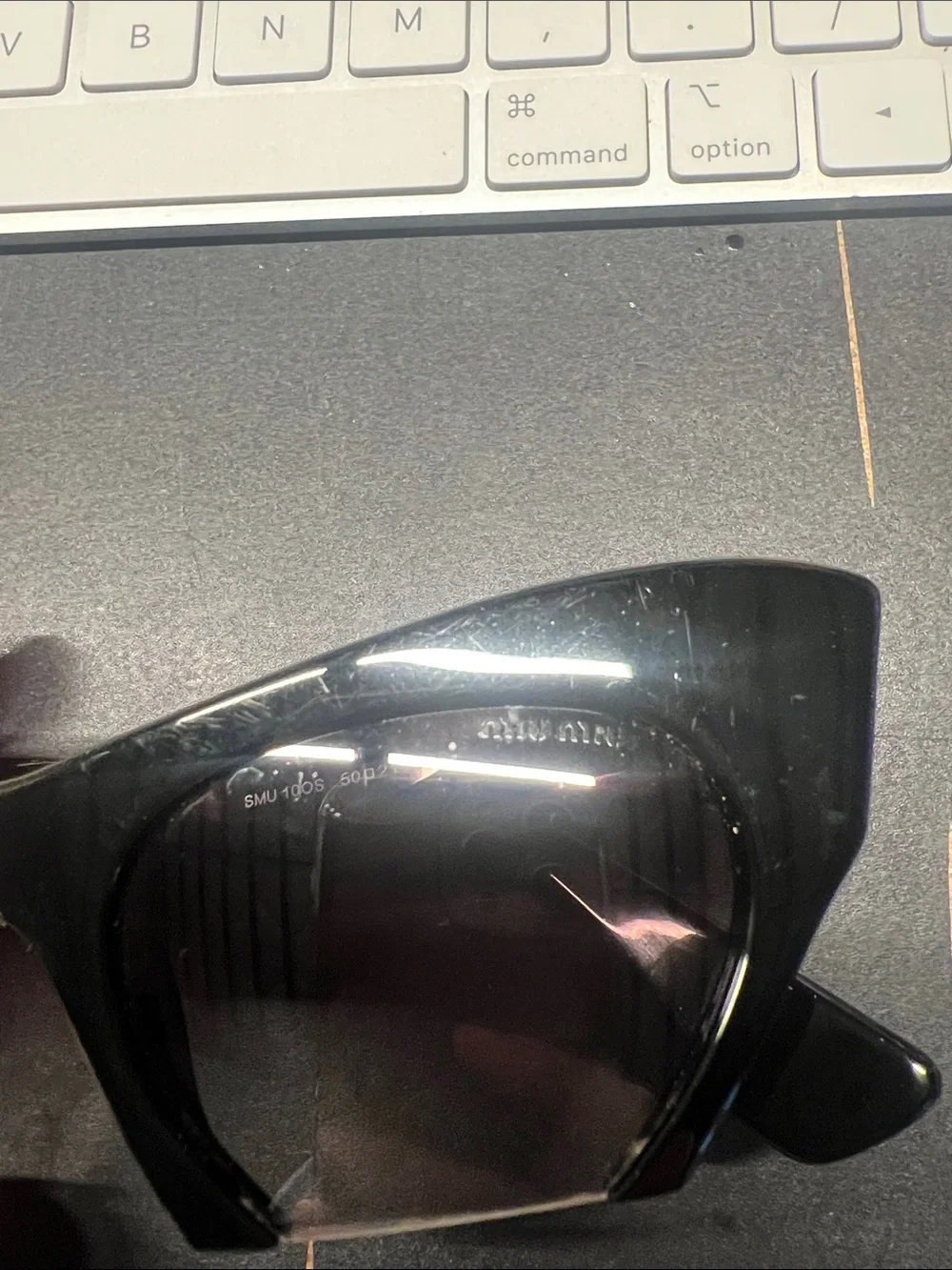 Miu Miu Black Cat-Eye Sunglasses with Gradient Lenses